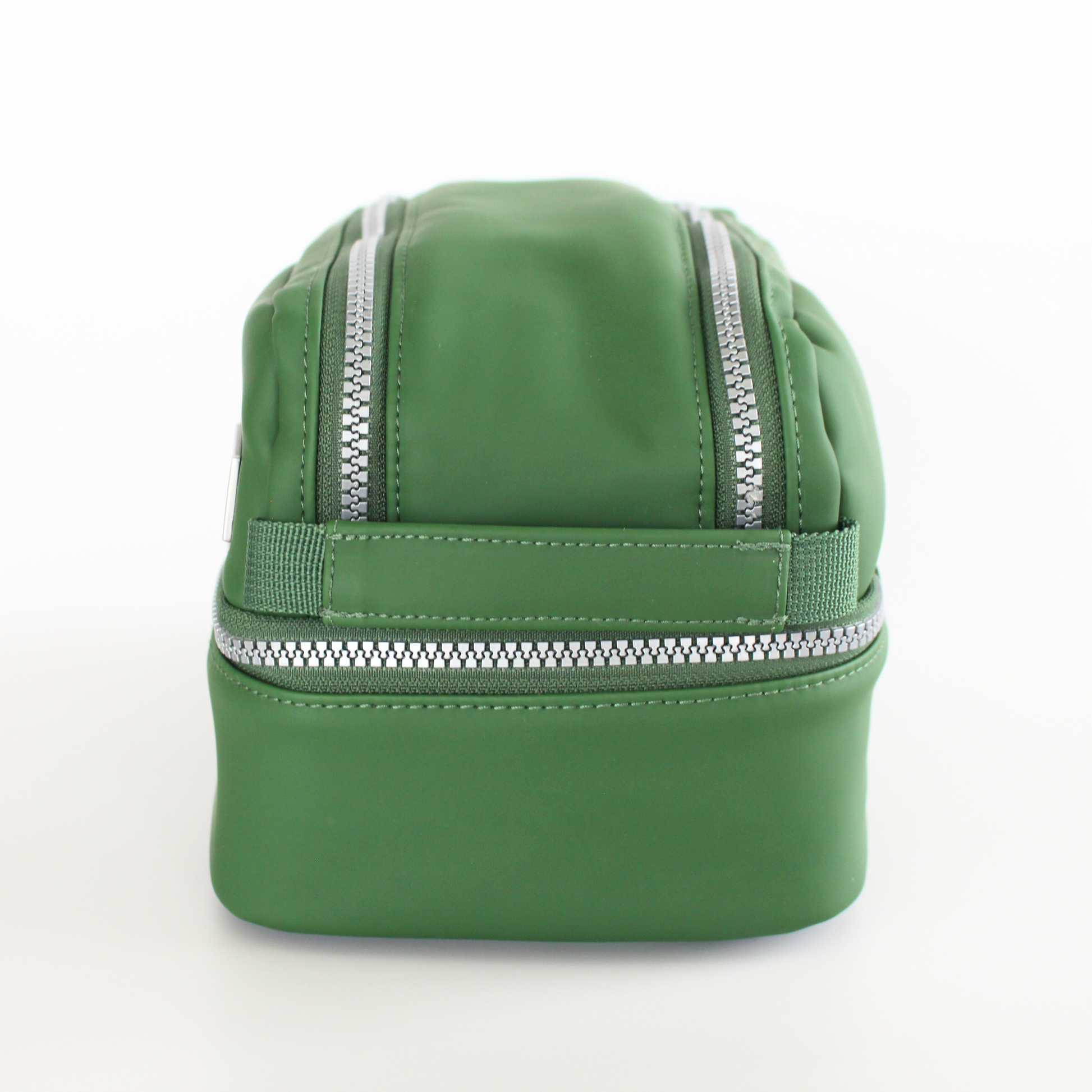 Green diabetes travel bag on a light gray background